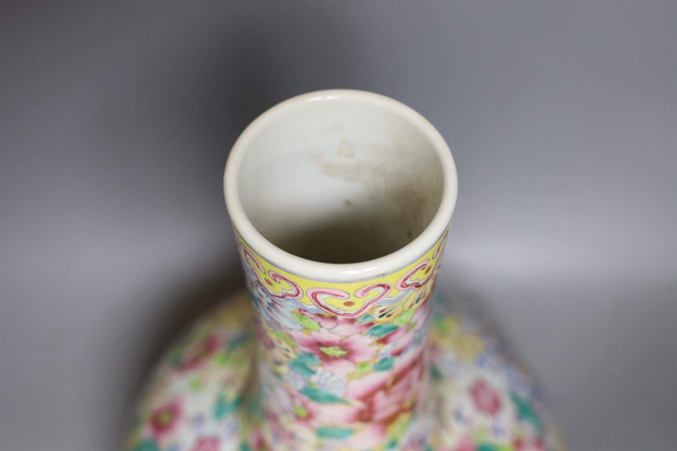A Chinese famille rose millefleur vase, 40cms high.